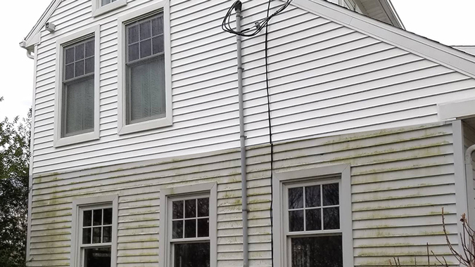 Before and After of a house cleaned by Pressure Brothers